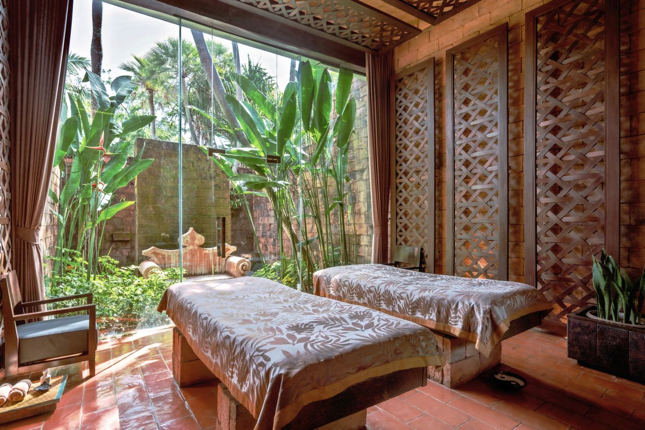 Two massage beds overlooking garden