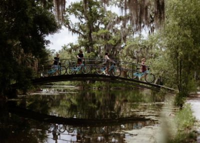 Group biking through park in New Orleans