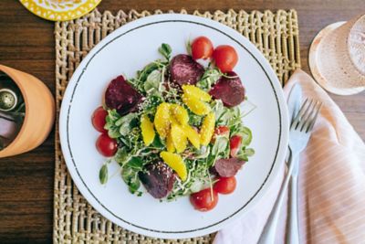 A plate of brightly colored vegetables