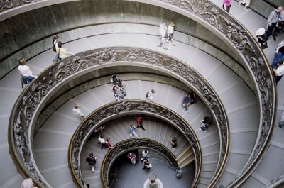 People walk the hallways of  the Vatican Museum