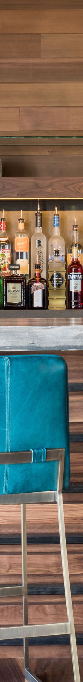 A wooden bar with stools