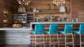 A wooden bar with stools