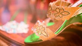 A woman?s sandal adorned with a diamante floral design