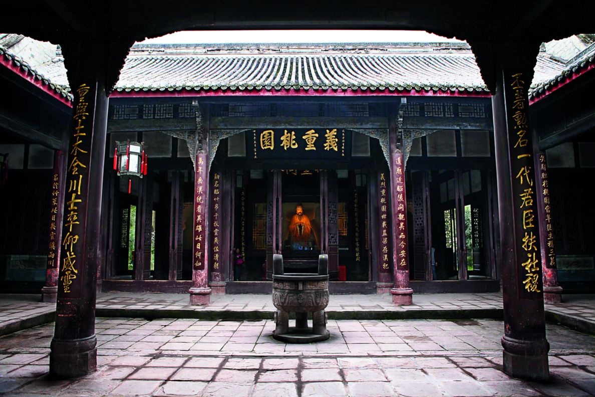Open inner courtyard of a temple with columns and stone floors