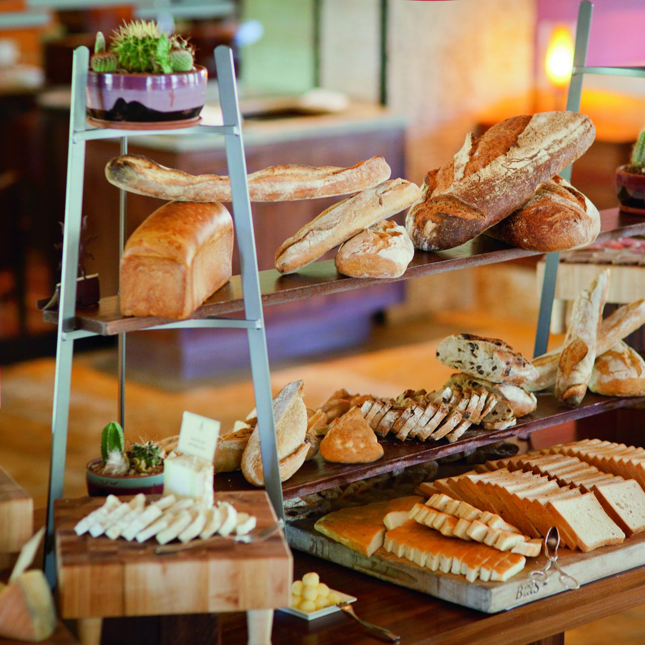 A display of breads, cheeses and slices meats
