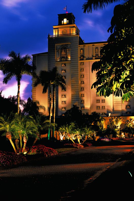 An exterior shot of the hotel at night.