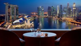 Dramatic view of the sea and city from the Club Level at The Ritz-Carlton, Millenia Singapore