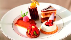 A plate with several small desserts