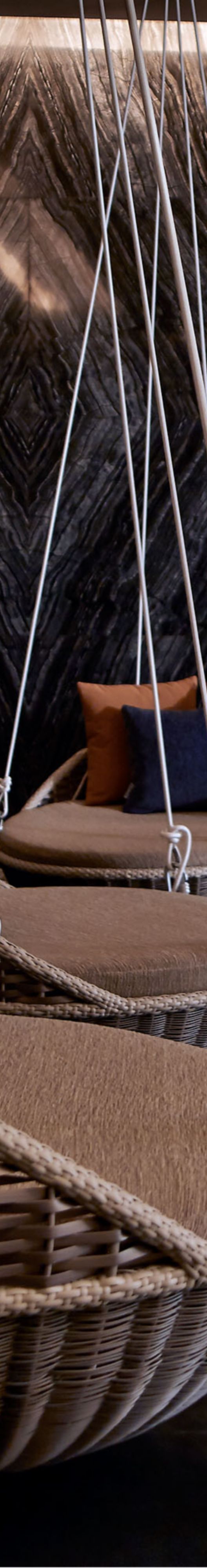 Swinging lounge seats at the spa.