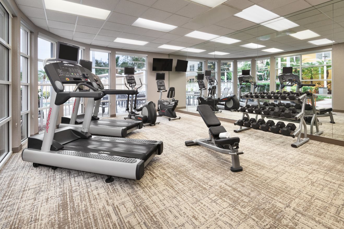 fitness center with treadmil, elliptical & weights