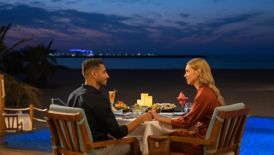 Couple enjoying romantic dining at Shore House