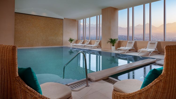 Indoor pool, windows with mountain view