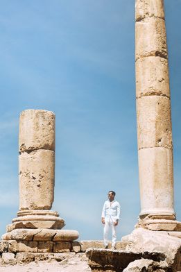 Man stands near ruins in Amman, Jordan