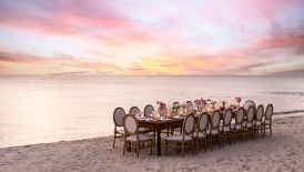 A beautiful long table beach reception