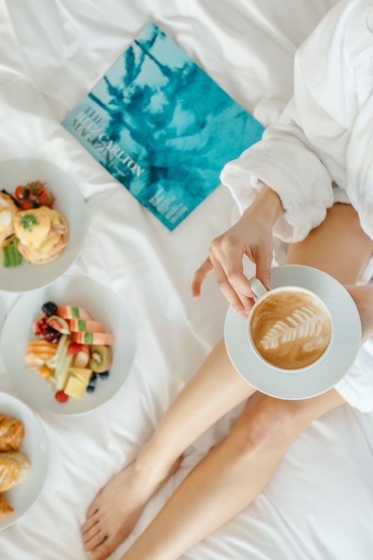 lady with breakfast in bed