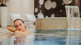woman relaxing in pool