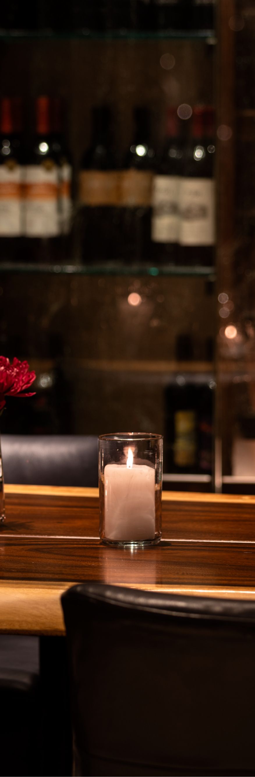 Table in front of wine display