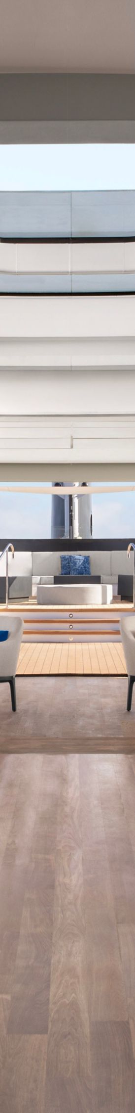 A large yacht moves through the sea