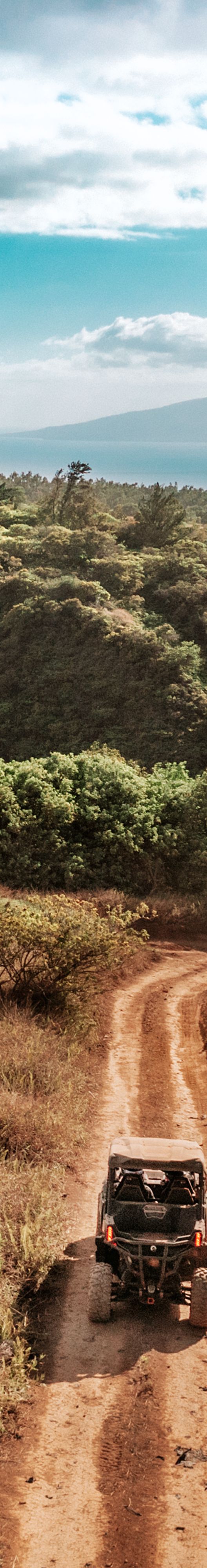 Aerial view of ATV driving down a trail.