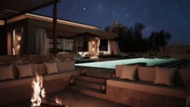 2 Bedroom Terrace and Pool during the nighttime 