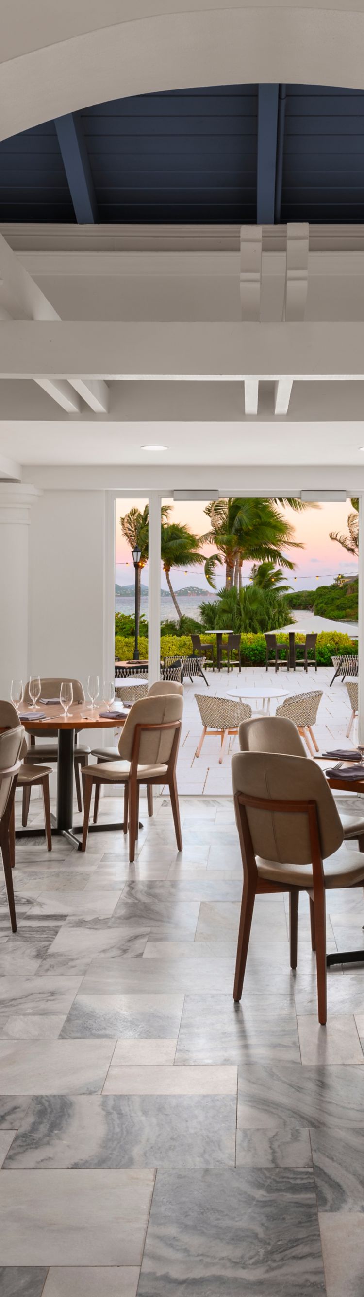 Bleuwater, chairs and tables, and large planters.