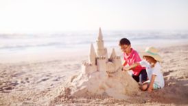 Kids building a sandcastle