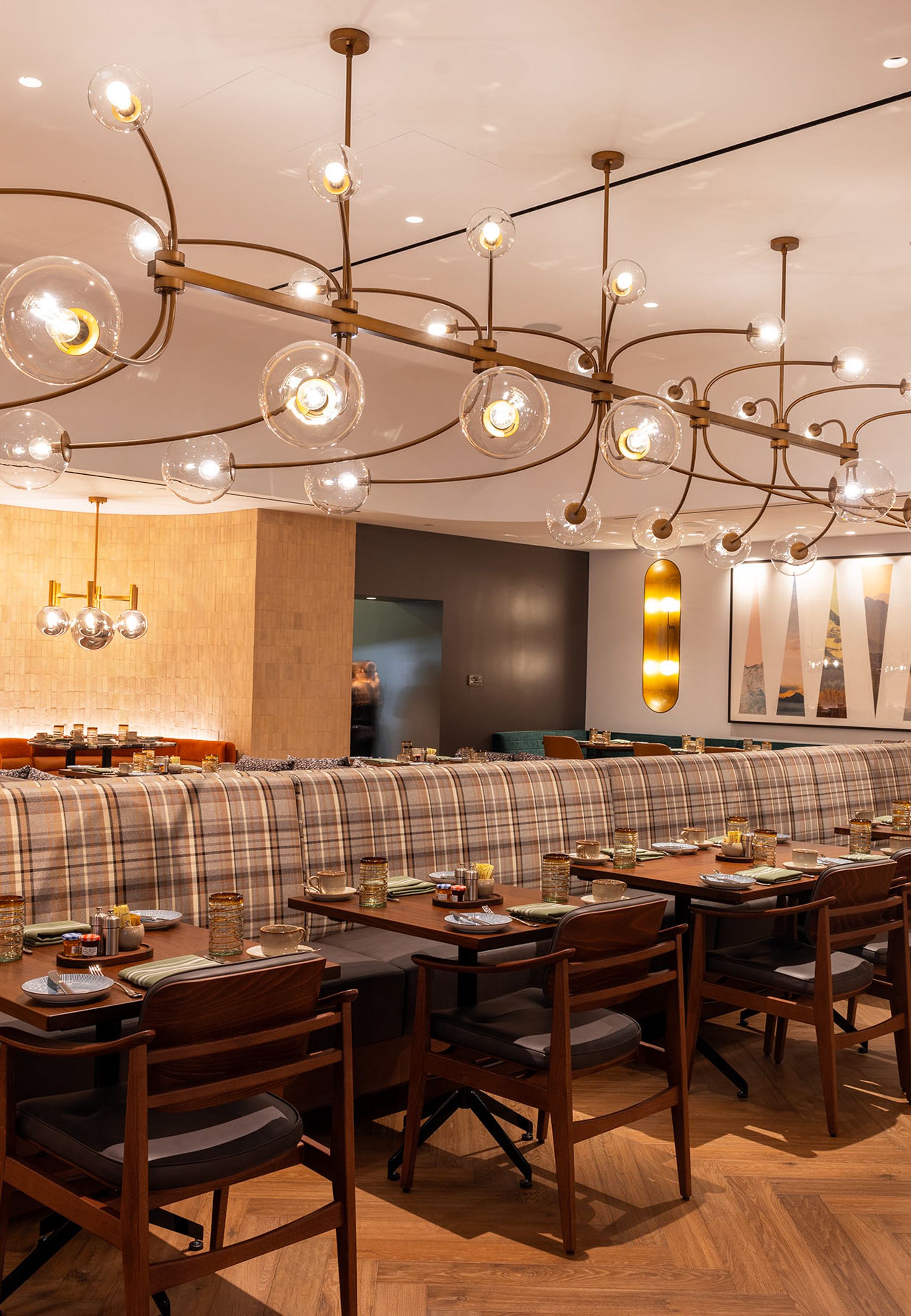 Dining area with multiple tables in frame