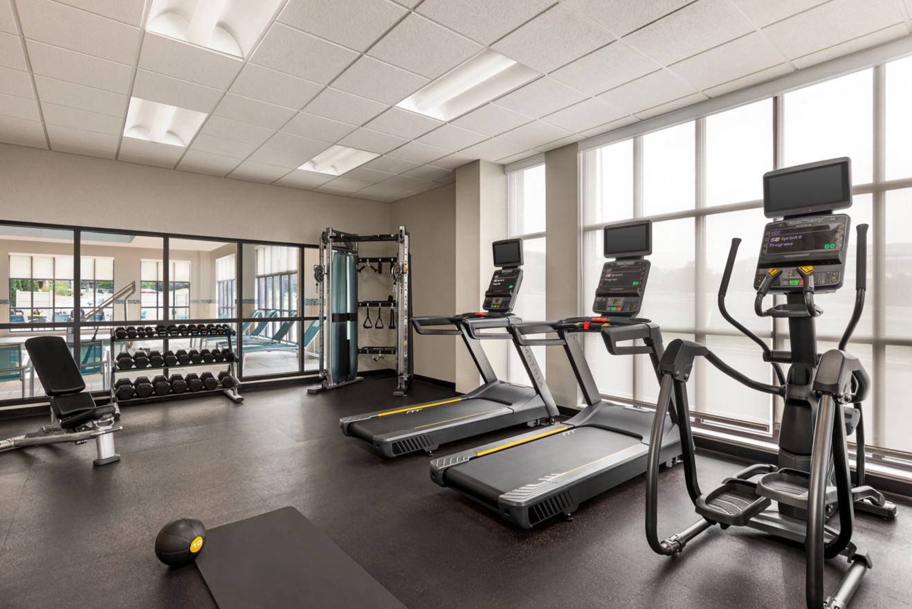 Guest fitness center with free weights & machines