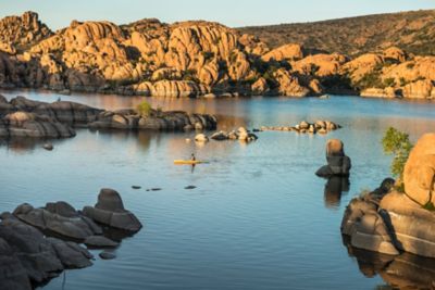 A lake surrounded by rock formations