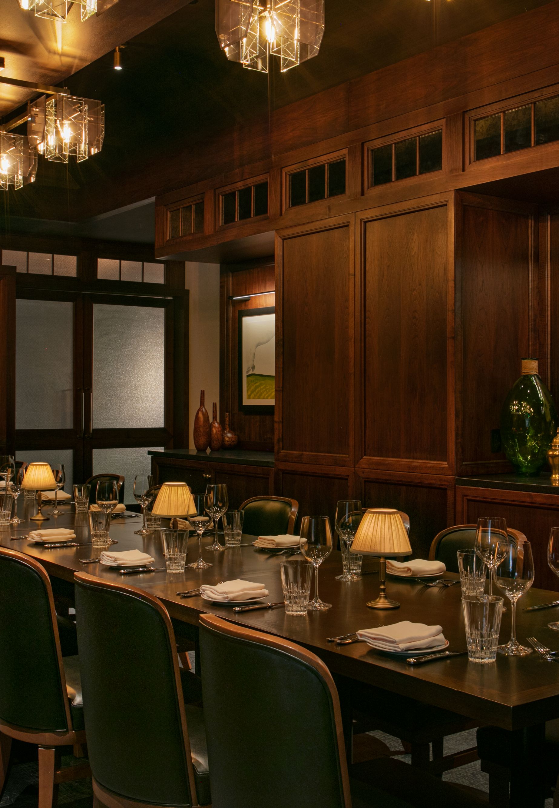 Private dining room with chandelier.