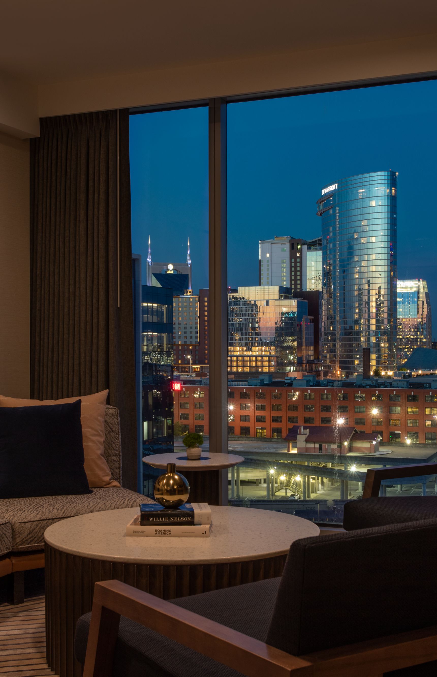 Living room with city skyline.