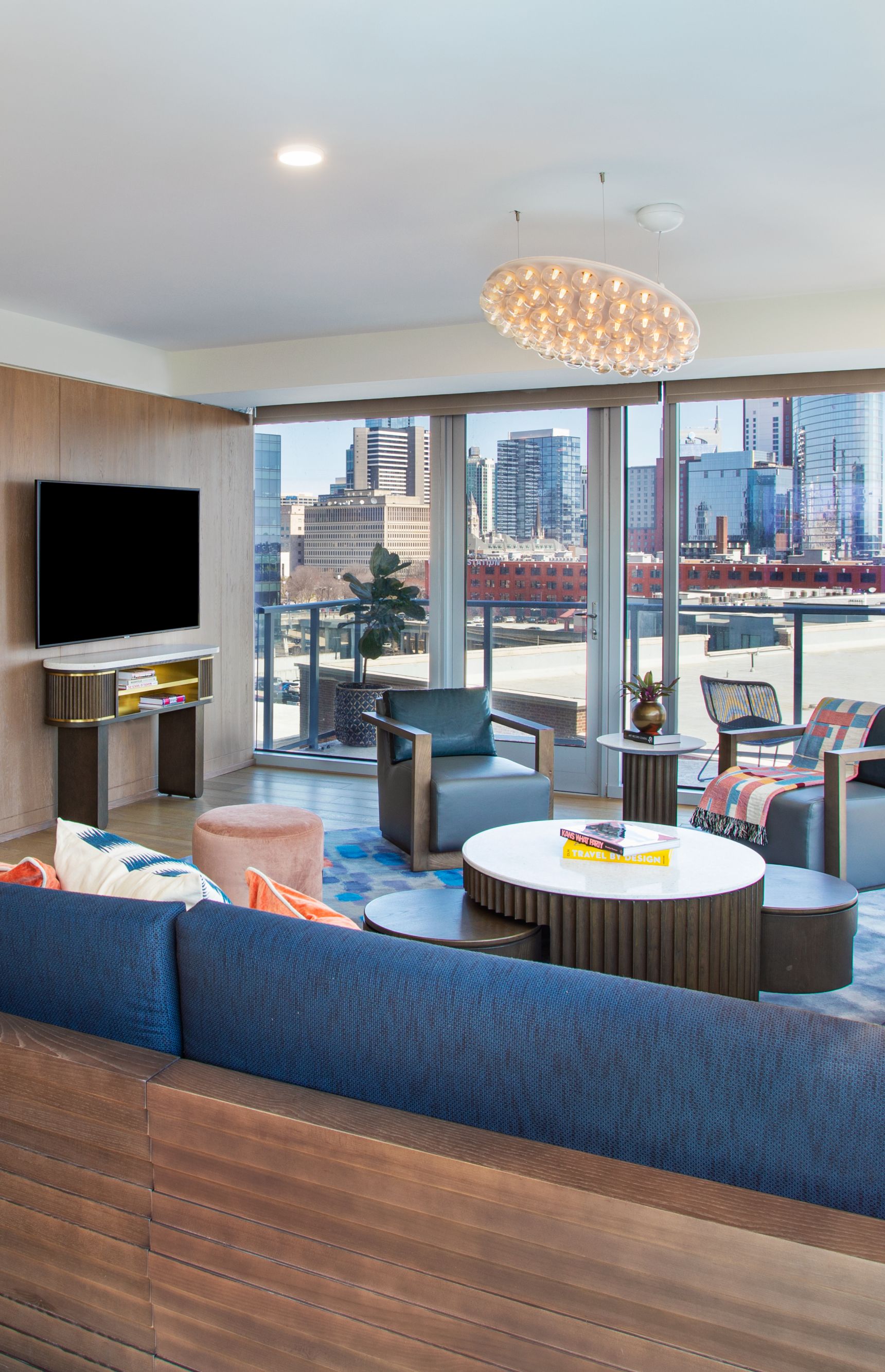 Oversized living room with wet bar and balcony. 