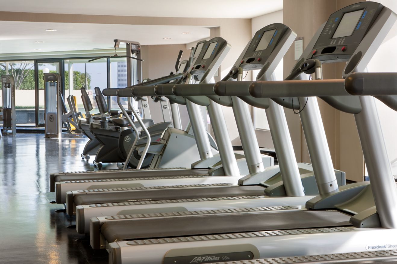 Fitness center with treadmills and stationary bike