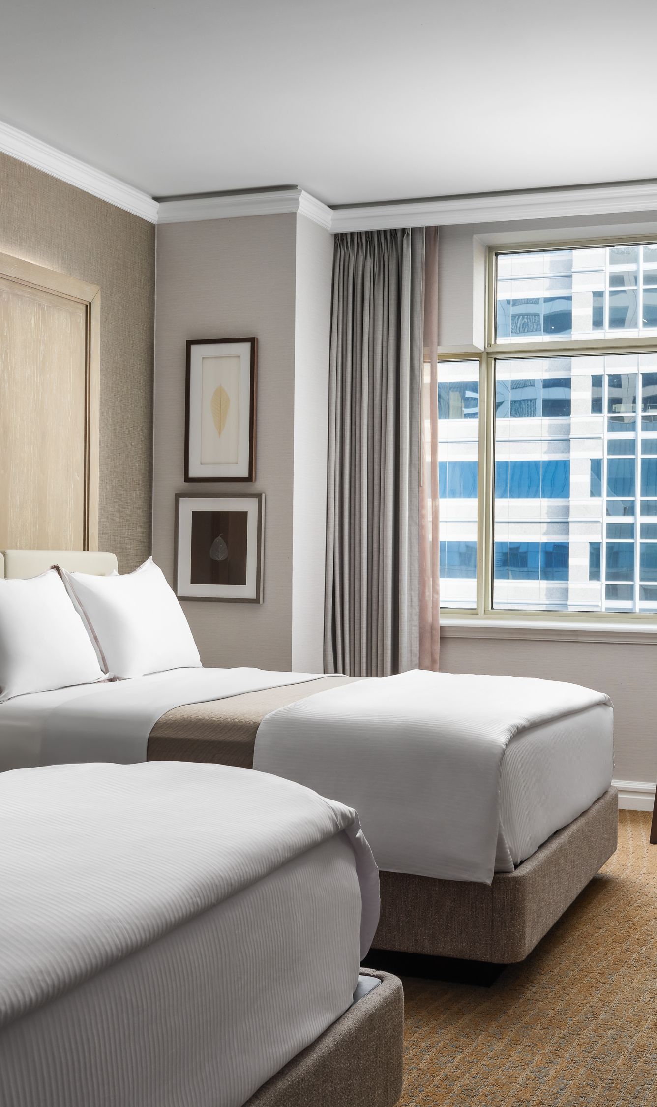 Guest room with two double beds.