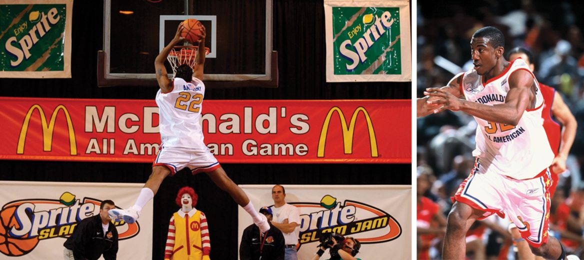 Carmelo Anthony (22) setting up a dunk and Amare Stoudemire (32) in action at the McDonald’s All American Games 2002