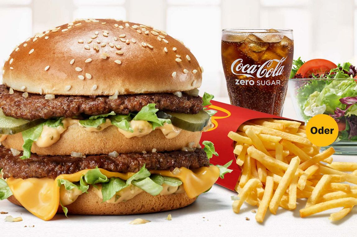 Abbildung des McMenü® mit Big Mac, große Pommes oder Snack Salad, großer Coca-Cola.