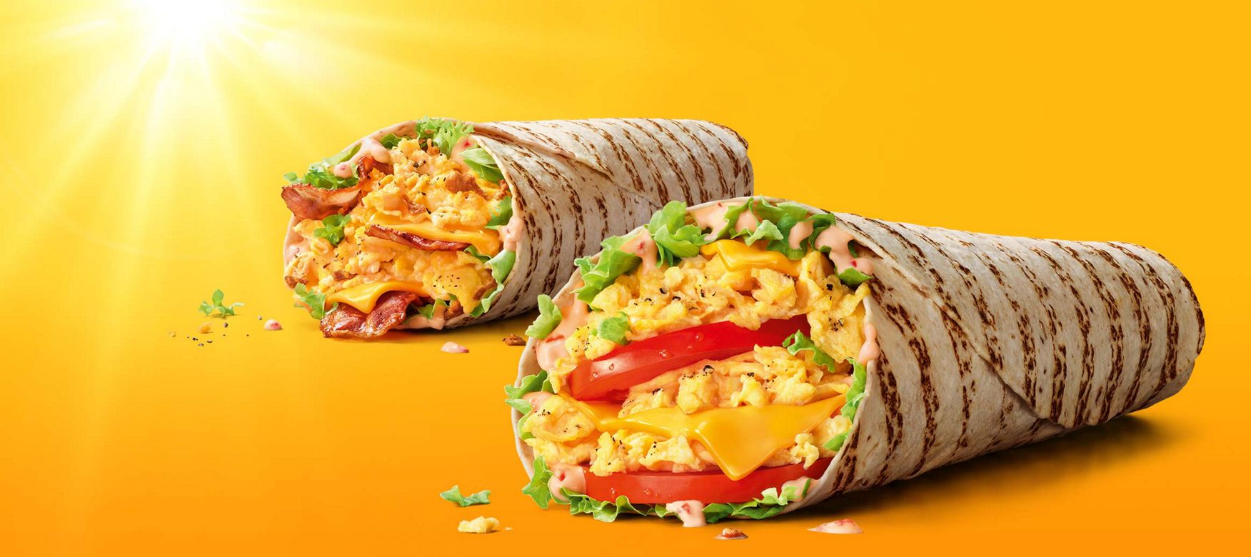 Das Bild zeigt den McToast® Cheese und den McToast® Bacon & Cheese.