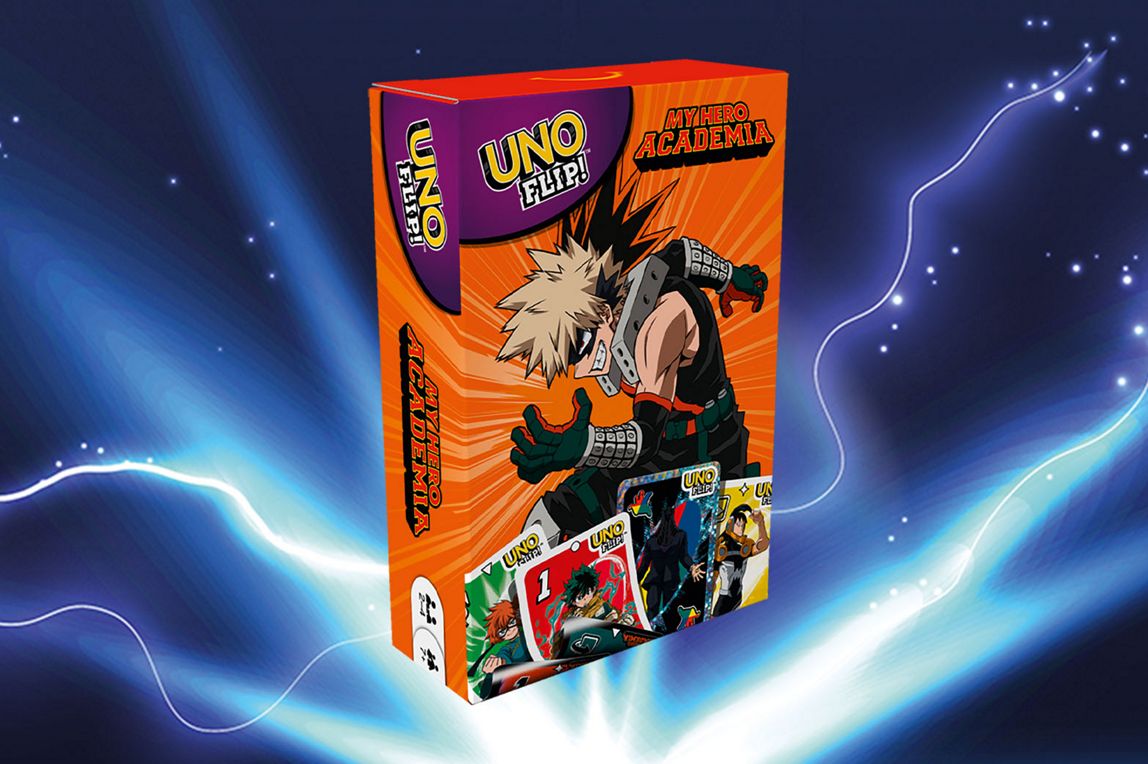 UNO My Hero Academia Box mit Anime Charakter Katsuki Bakugo auf orange Explosionen-Hintergrund. Logos und Spielkarten unten.