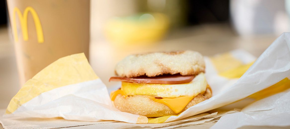 Egg McMuffin Sandwich with an iced coffee 