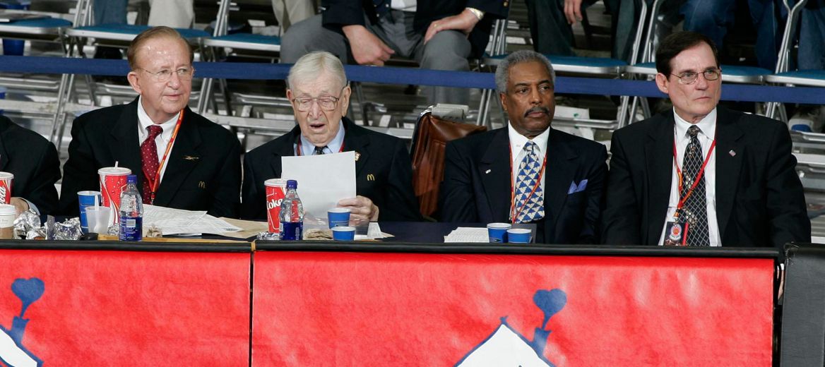 Morgan Wootten, Howard Garfinkel, Sonny Hill, and Bob Geoghan commentating on the sidelines of the McDonald’s All American Games; Photo by Brian Spurlock/McDonald’s