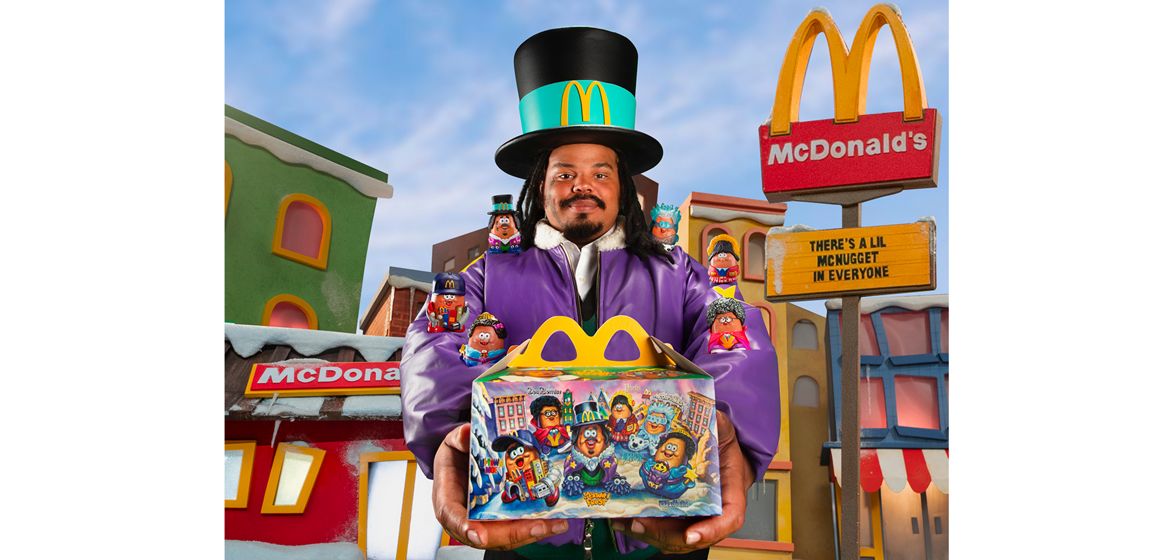 Kerwin Frost holding a happy meal box 