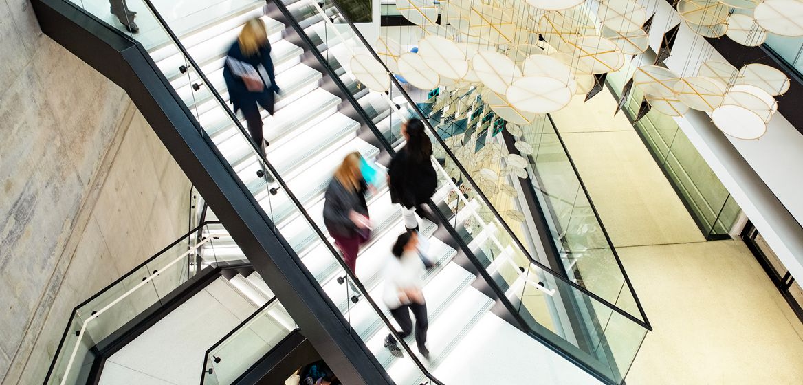 McDonalds Employees walking down a staircase 