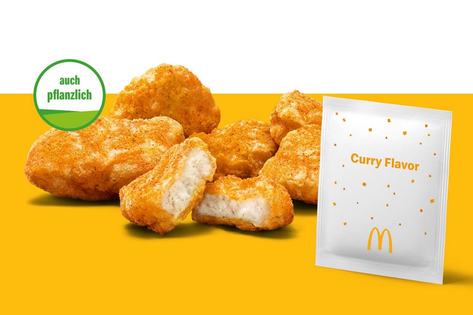 Abbildung Shaker Chicken McNuggets® Curry Flavor mit dem Störer "auch pflanzlich".