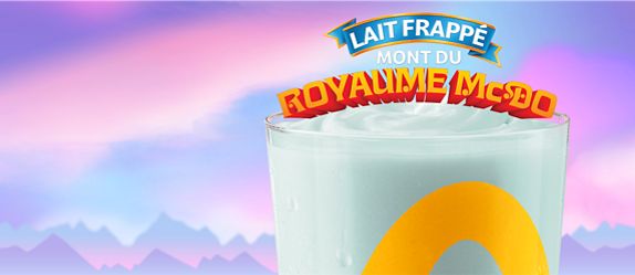 Un gros plan sur un Lait frappé mont du Royaume McDo avec l’inscription « Lait frappé mont du Royaume McDo » au-dessus.