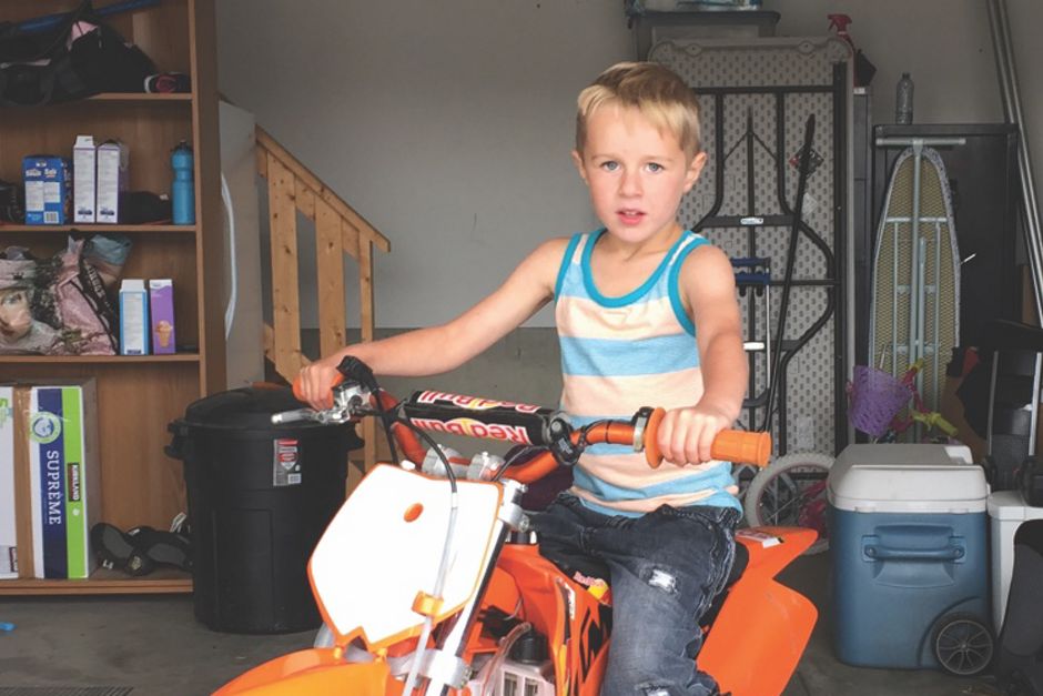 child with motorbike
