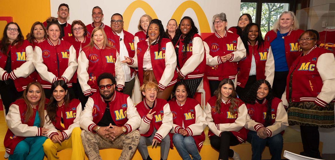 various people wearing varsity jackets 