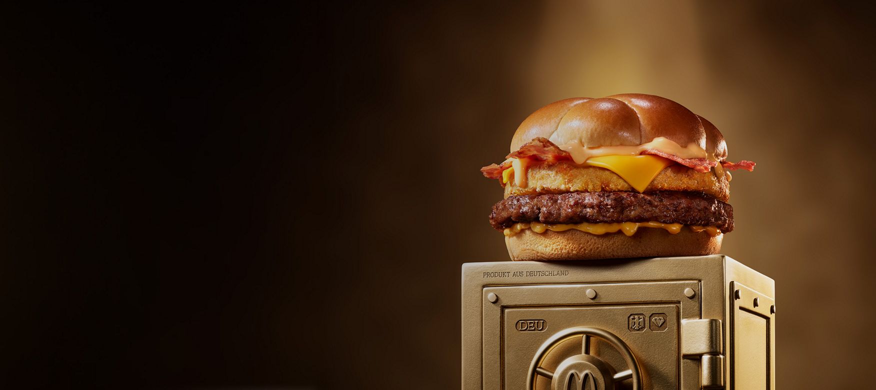 McDonald’s Big Rosti sits on top of a gold vault.