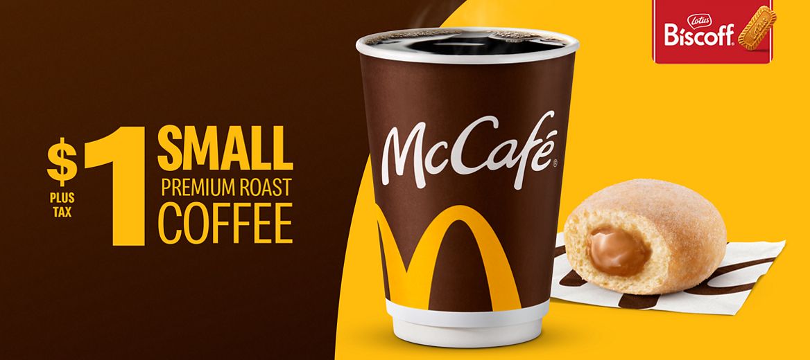 A cup of coffee with the word ‘McCafe® on it, a McPop™ beside it on the right, and a Lotus Biscoff logo on the top right corner. 