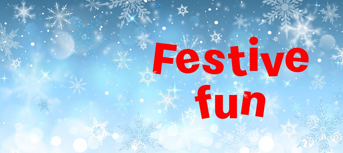 A Happy Meal box on a snowy blue background with snowflakes.