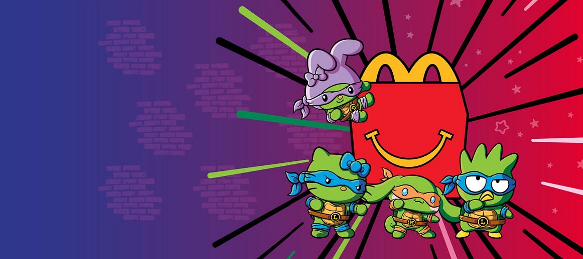Cartoon Kitty Ninja Turtles in front of a red McDonald’s Happy Meal box on a colorful background